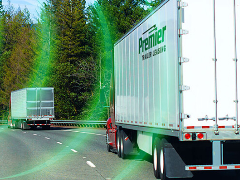 Two Premier trucks utilizing cargo sensing technology